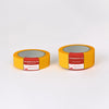 Zwei Rollen Goldband ECO UV-30 von Abdeckfuchs24 mit 30 mm und 50 mm Breite im direkten Vergleich – UV-beständiges Klebeband für präzise Abdeckarbeiten